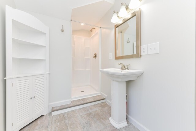 127 Brads Way, Russells Point, OH 43348 - full bathroom with a shower and baseboards