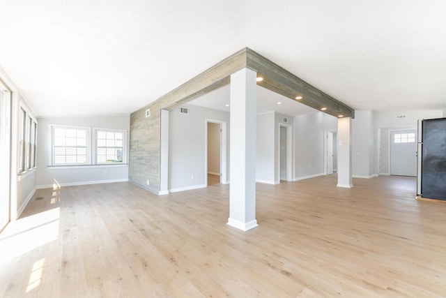 127 Brads Way, Russells Point, OH 43348 - unfurnished living room with plenty of natural light, light wood-style flooring, and recessed lighting