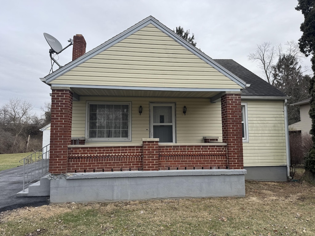 bungalow featuring a porch