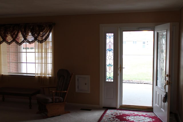 entryway with carpet