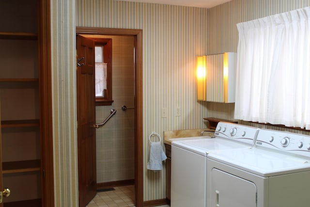 laundry room featuring washer and dryer