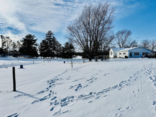 view of snowy yard