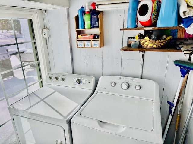 laundry area featuring washing machine and clothes dryer