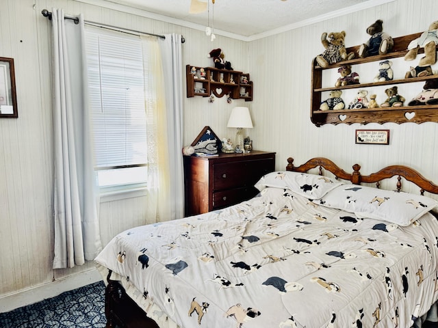 bedroom featuring crown molding