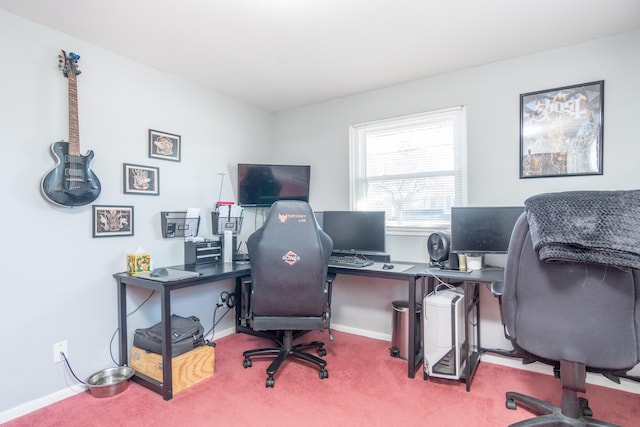 office with baseboards and carpet floors