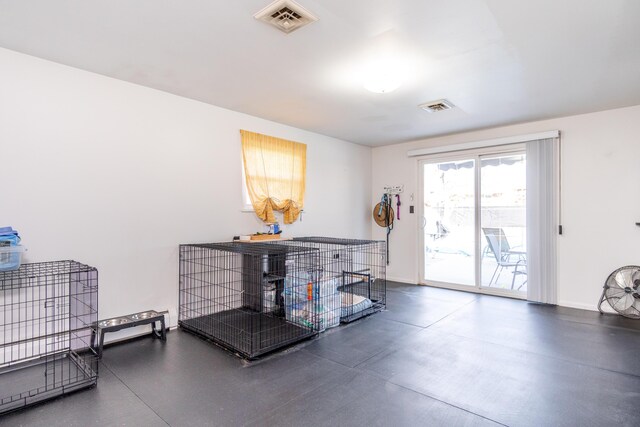 miscellaneous room with baseboards and visible vents