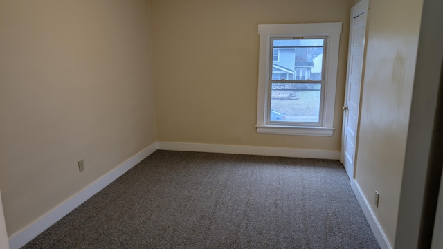 unfurnished room with carpet floors