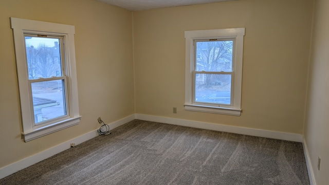 view of carpeted spare room