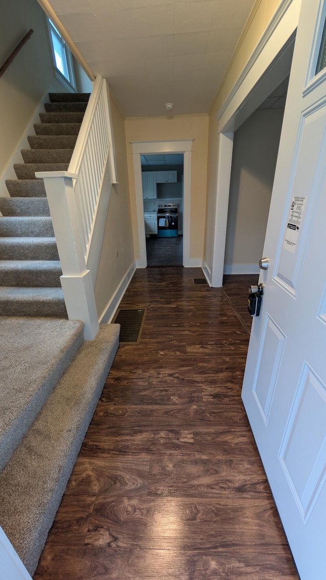 interior space with dark wood-type flooring