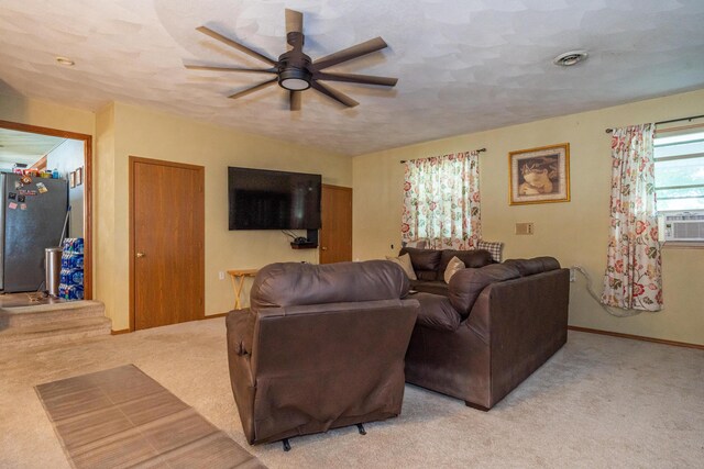 302 N W St, Arcanum, OH 45304 - living area featuring a ceiling fan, light colored carpet, and cooling unit