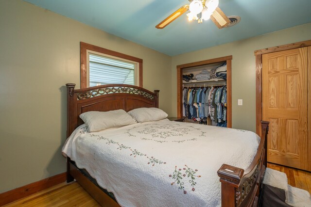 302 N W St, Arcanum, OH 45304 - bedroom featuring wood finished floors, a closet, and ceiling fan