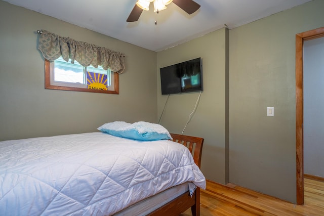 302 N W St, Arcanum, OH 45304 - bedroom with wood finished floors and a ceiling fan