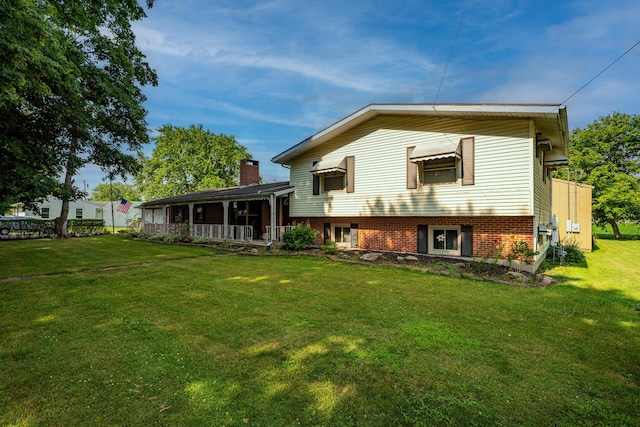 302 N W St, Arcanum, OH 45304 - rear view of house with a yard and a chimney