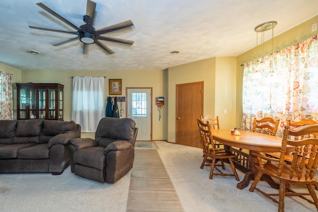 302 N W St, Arcanum, OH 45304 - dining space with a ceiling fan and light colored carpet