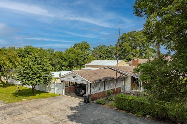 302 N W St, Arcanum, OH 45304 - view of front of property featuring driveway, a chimney, and roof with shingles