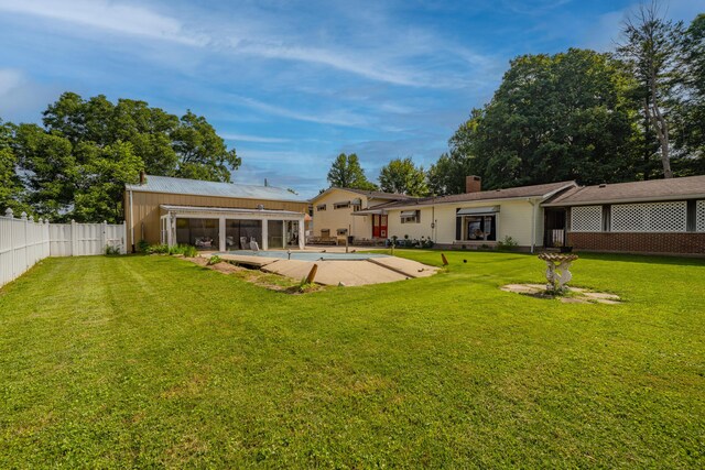 302 N W St, Arcanum, OH 45304 - rear view of property with a chimney and a patio