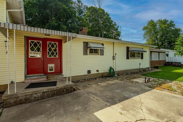 302 N W St, Arcanum, OH 45304 - exterior space featuring crawl space, a chimney, entry steps, and a front yard