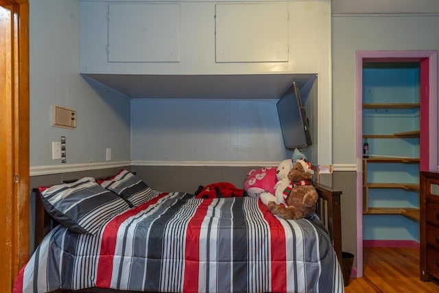 302 N W St, Arcanum, OH 45304 - bedroom featuring wood finished floors and baseboards