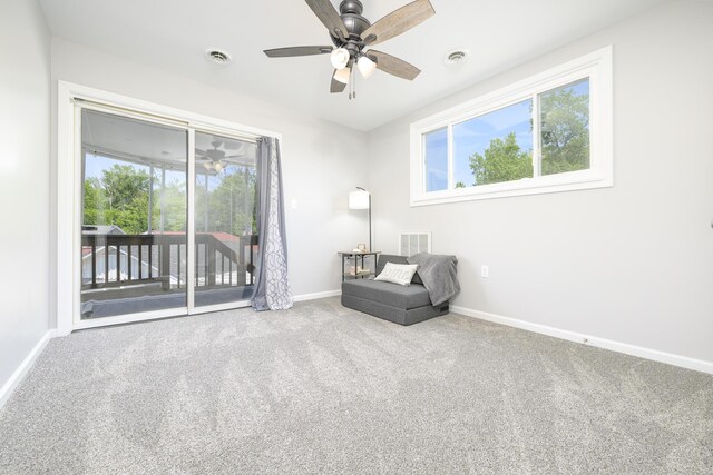 11531 Circle Dr, Lakeview, OH 43331 - sitting room featuring ceiling fan, carpet floors, and plenty of natural light