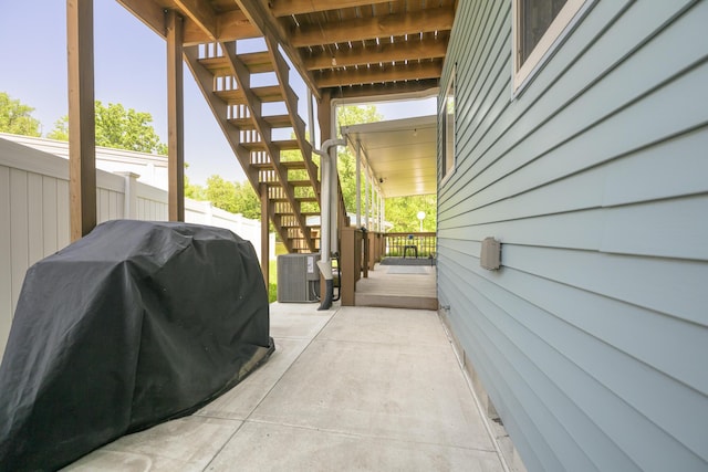 11531 Circle Dr, Lakeview, OH 43331 - view of patio with stairs and area for grilling