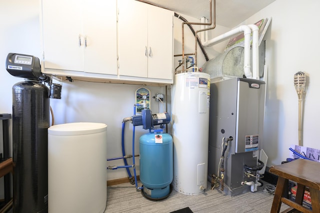 11531 Circle Dr, Lakeview, OH 43331 - utility room with electric water heater