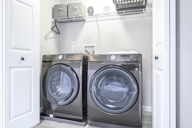 11531 Circle Dr, Lakeview, OH 43331 - laundry room with washing machine and clothes dryer