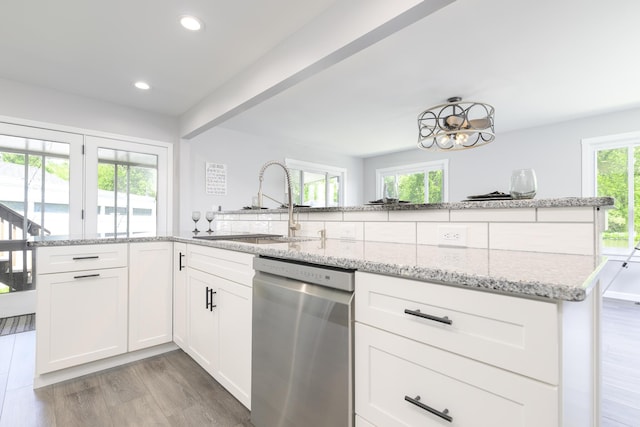 11531 Circle Dr, Lakeview, OH 43331 - kitchen with dishwasher, light wood-style flooring, light stone countertops, white cabinetry, and recessed lighting