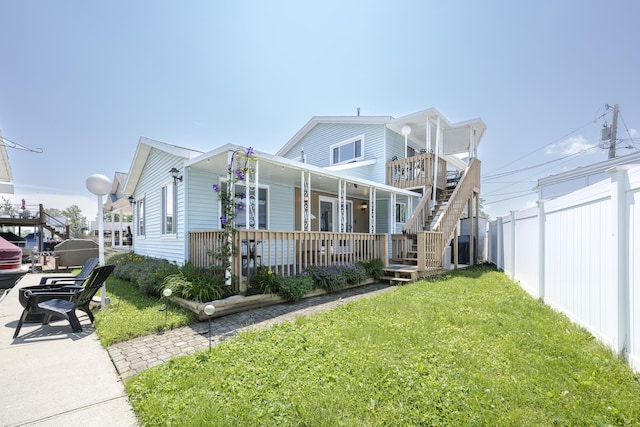 11531 Circle Dr, Lakeview, OH 43331 - view of front of property with covered porch and stairs