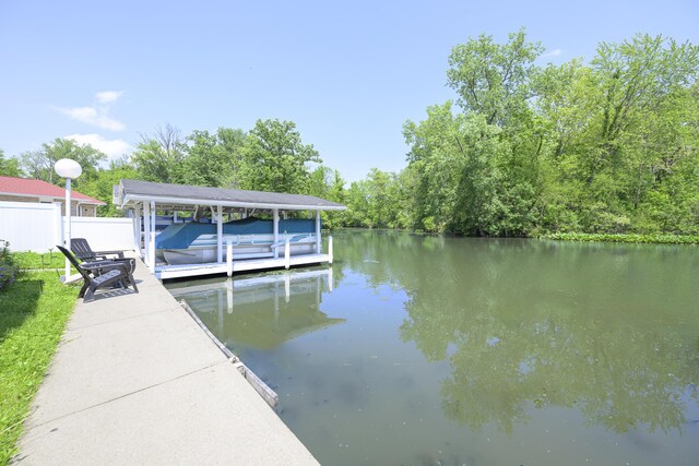 11531 Circle Dr, Lakeview, OH 43331 - dock featuring boat lift and a water view