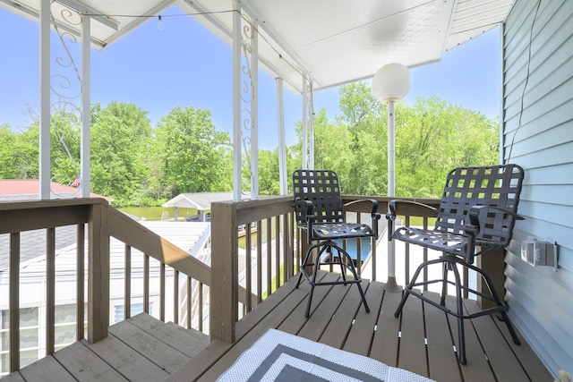 11531 Circle Dr, Lakeview, OH 43331 - wooden terrace featuring view of scattered trees
