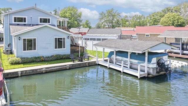 11531 Circle Dr, Lakeview, OH 43331 - dock featuring boat lift and a water view