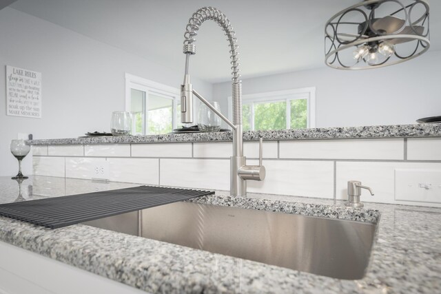 11531 Circle Dr, Lakeview, OH 43331 - kitchen view of white cabinetry and light stone countertops