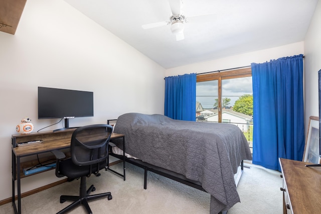 10339 County Road 286 Unit D4, Huntsville, OH 43324 - carpeted bedroom featuring lofted ceiling, access to exterior, a desk, a ceiling fan, and baseboards