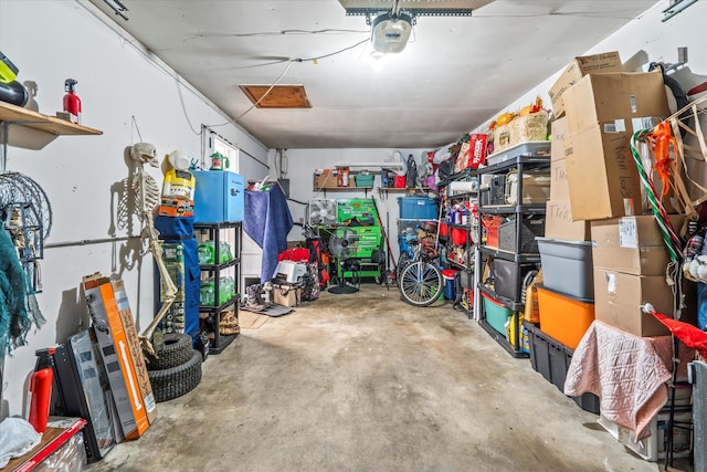 garage featuring a garage door opener