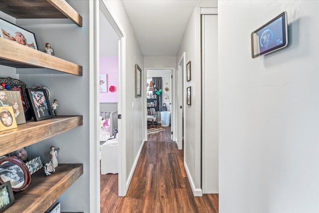 hallway featuring dark hardwood / wood-style floors