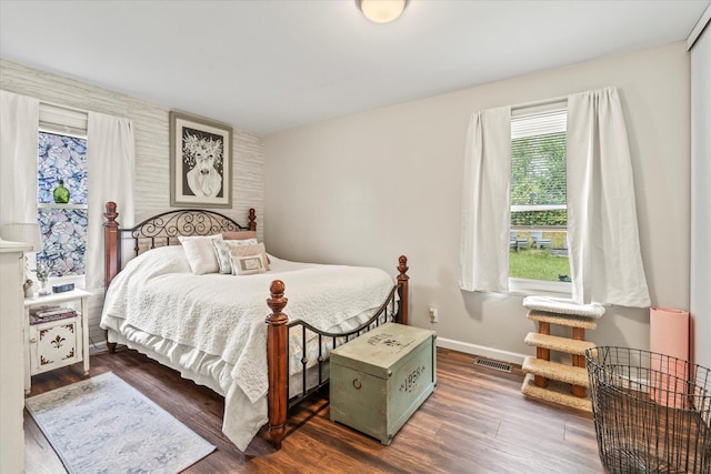 bedroom featuring dark hardwood / wood-style flooring