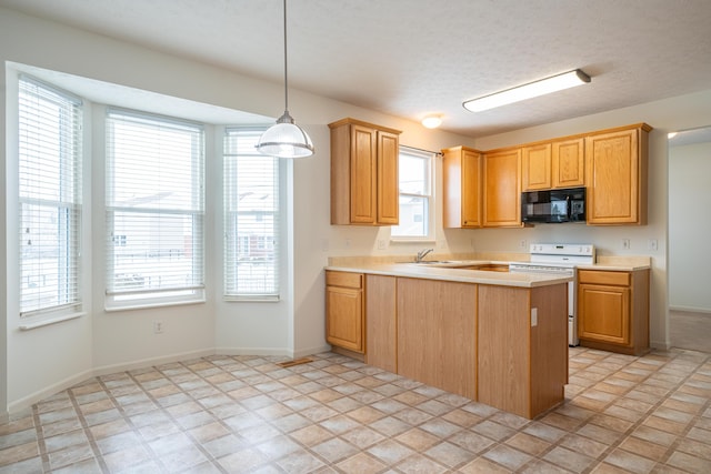 kitchen featuring sink, a textured ceiling, white electric stove, kitchen peninsula, and pendant lighting