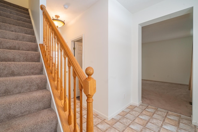 stairs with carpet floors