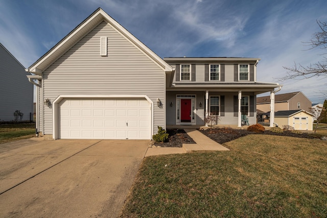 view of front of property with a garage, a front yard, and covered porch