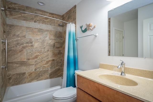 full bathroom featuring toilet, vanity, and shower / bath combo with shower curtain