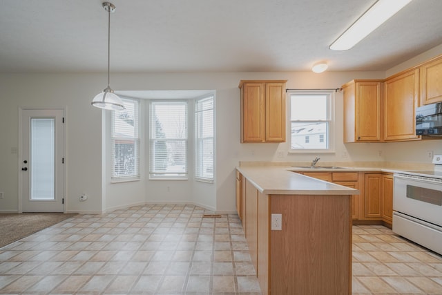 kitchen featuring pendant lighting, white electric range, light brown cabinetry, sink, and kitchen peninsula