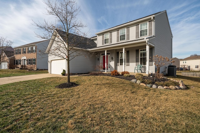 view of front of house with a garage, central AC, a front yard, and covered porch