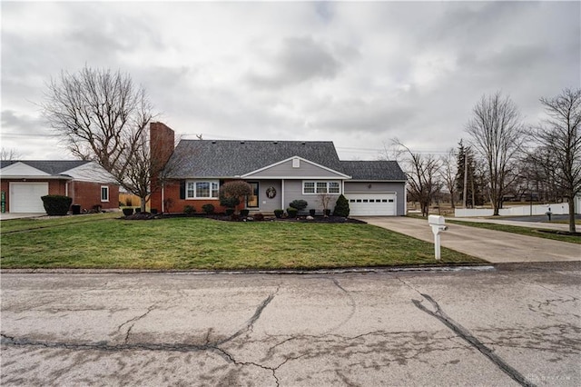 view of front of property featuring concrete driveway, an attached garage, a front yard, brick siding, and a chimney