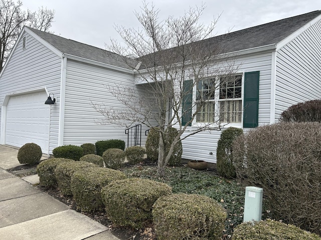 view of home's exterior featuring a garage