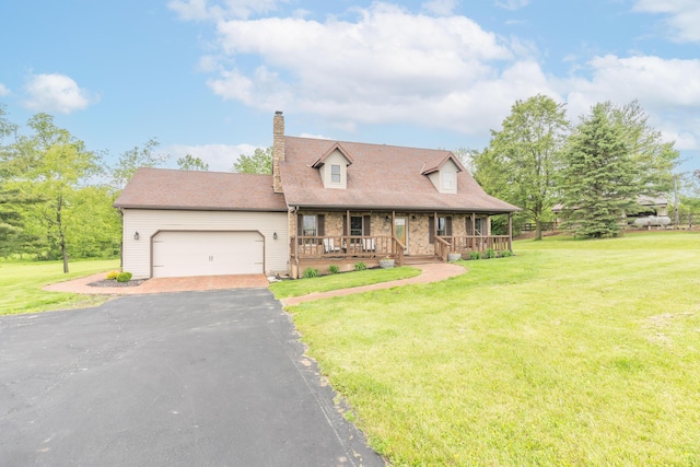 9162 Township Road 169 N, West Liberty, OH 43357 - new england style home featuring a porch, a chimney, a front lawn, and an attached garage