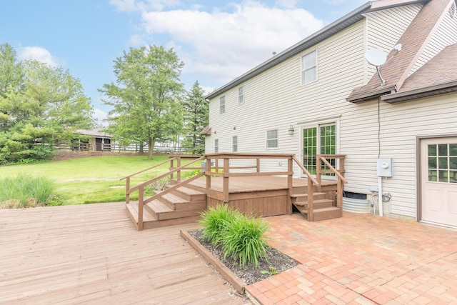 9162 Township Road 169 N, West Liberty, OH 43357 - wooden deck featuring a lawn and a patio area