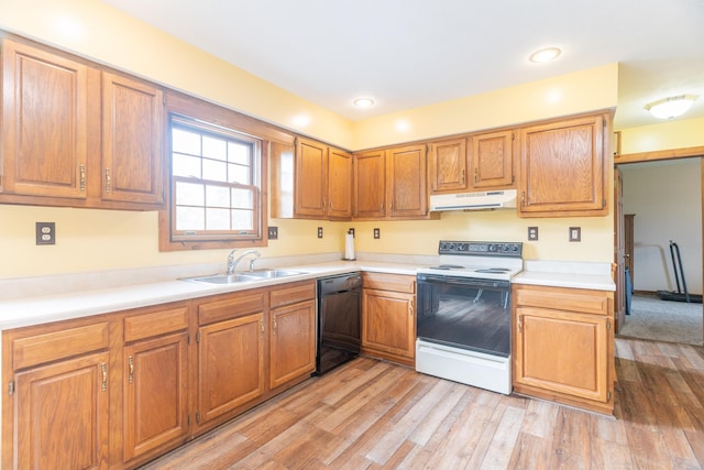 9162 Township Road 169 N, West Liberty, OH 43357 - kitchen with electric stove, under cabinet range hood, dishwasher, a sink, and light wood finished floors