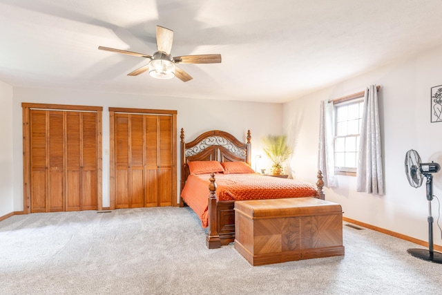 9162 Township Road 169 N, West Liberty, OH 43357 - bedroom featuring carpet, multiple closets, baseboards, and ceiling fan