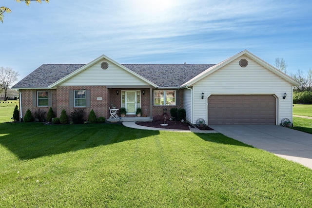 ranch-style home with a front yard, brick siding, concrete driveway, an attached garage, and a shingled roof