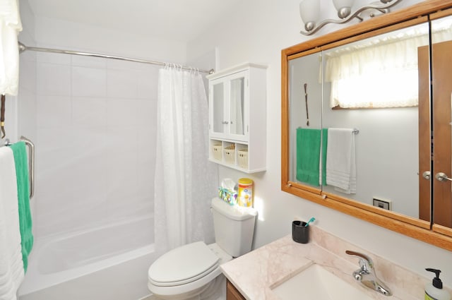 full bathroom featuring vanity, shower / bath combination with curtain, and toilet